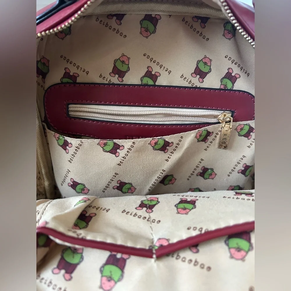 BEIBAOBAO BRICK RED BACKPACK. GORGEOUS COLOR. TOP HANDLE, ADJUSTABLE STRAPS.